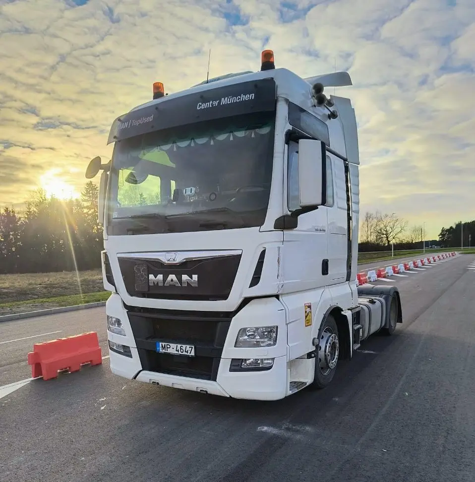 SIA PM Transport MAN truck for international shipping